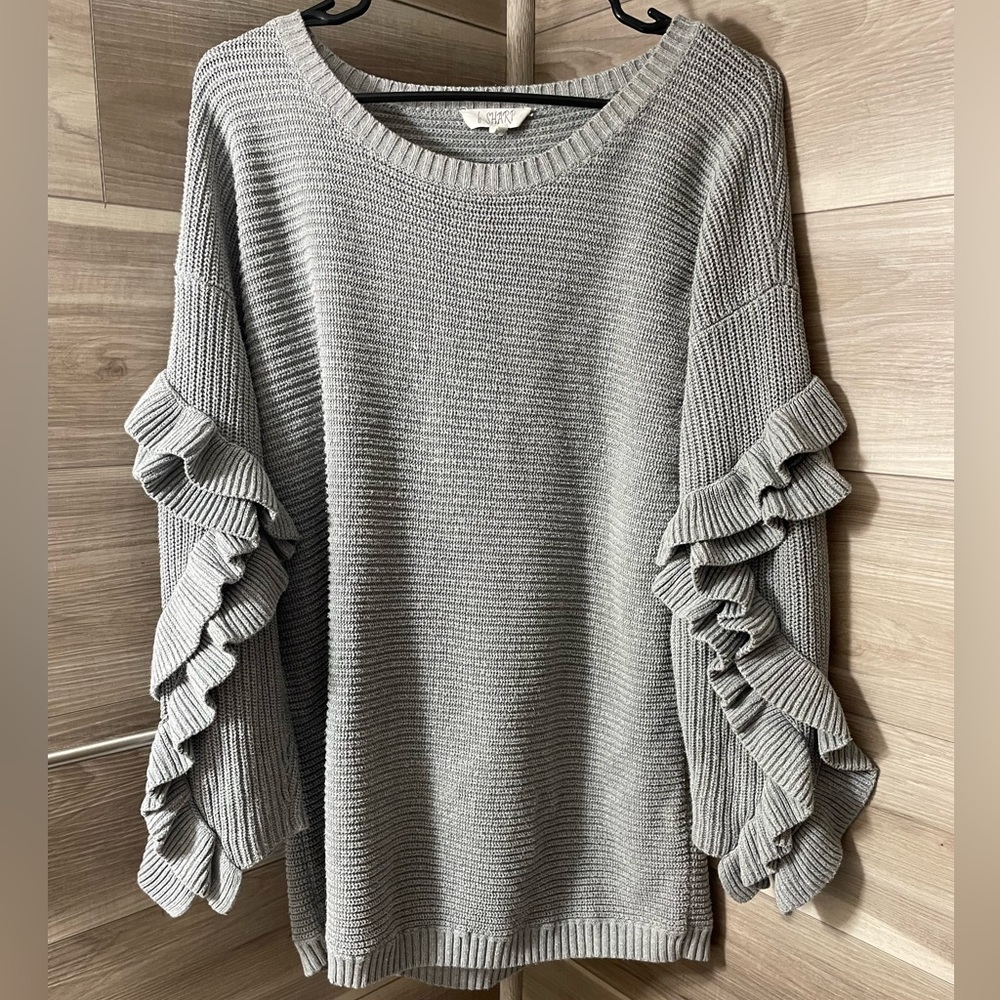 Heavy sweater , with ruffle ends